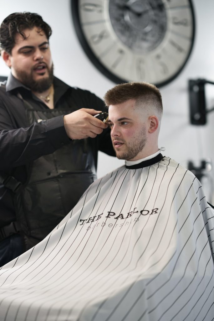 Skin fade haircut by Damian at The Parlor Barbershop, a barbershop near Vernon Hills in Libertyville, IL