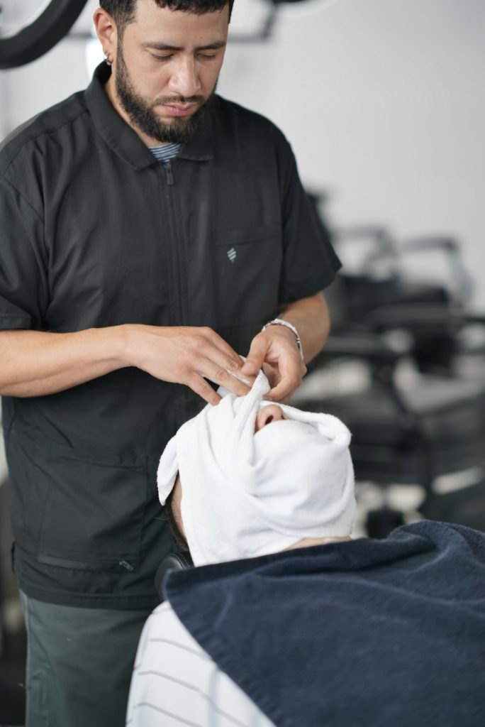 Hot towel shave by Leo at The Parlor Barbershop