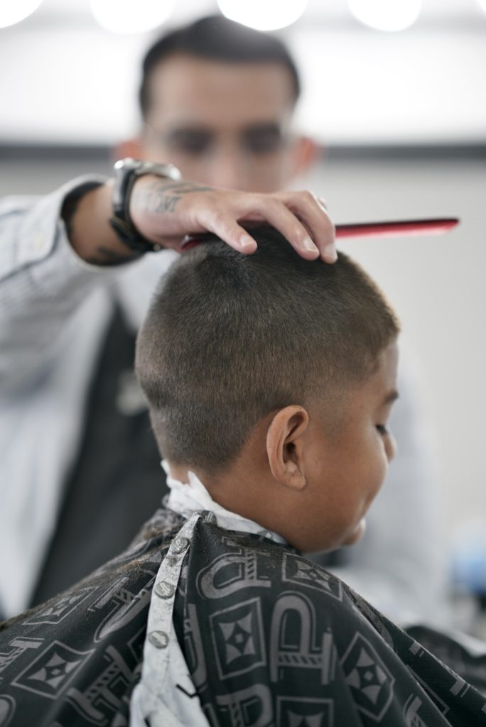 Buzz cut with a taper fade by Brian at The Parlor Barbershop in Libertyville
