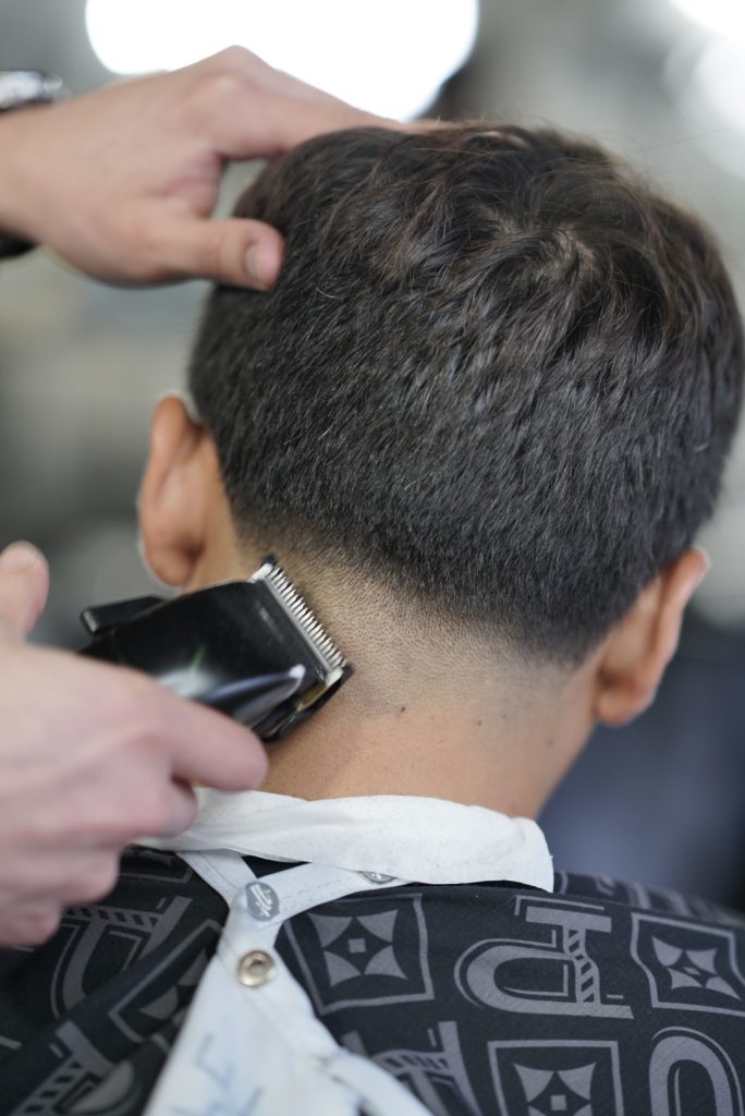 Textured top with tapered sides by Nikko at The Parlor Barbershop in Libertyville, IL